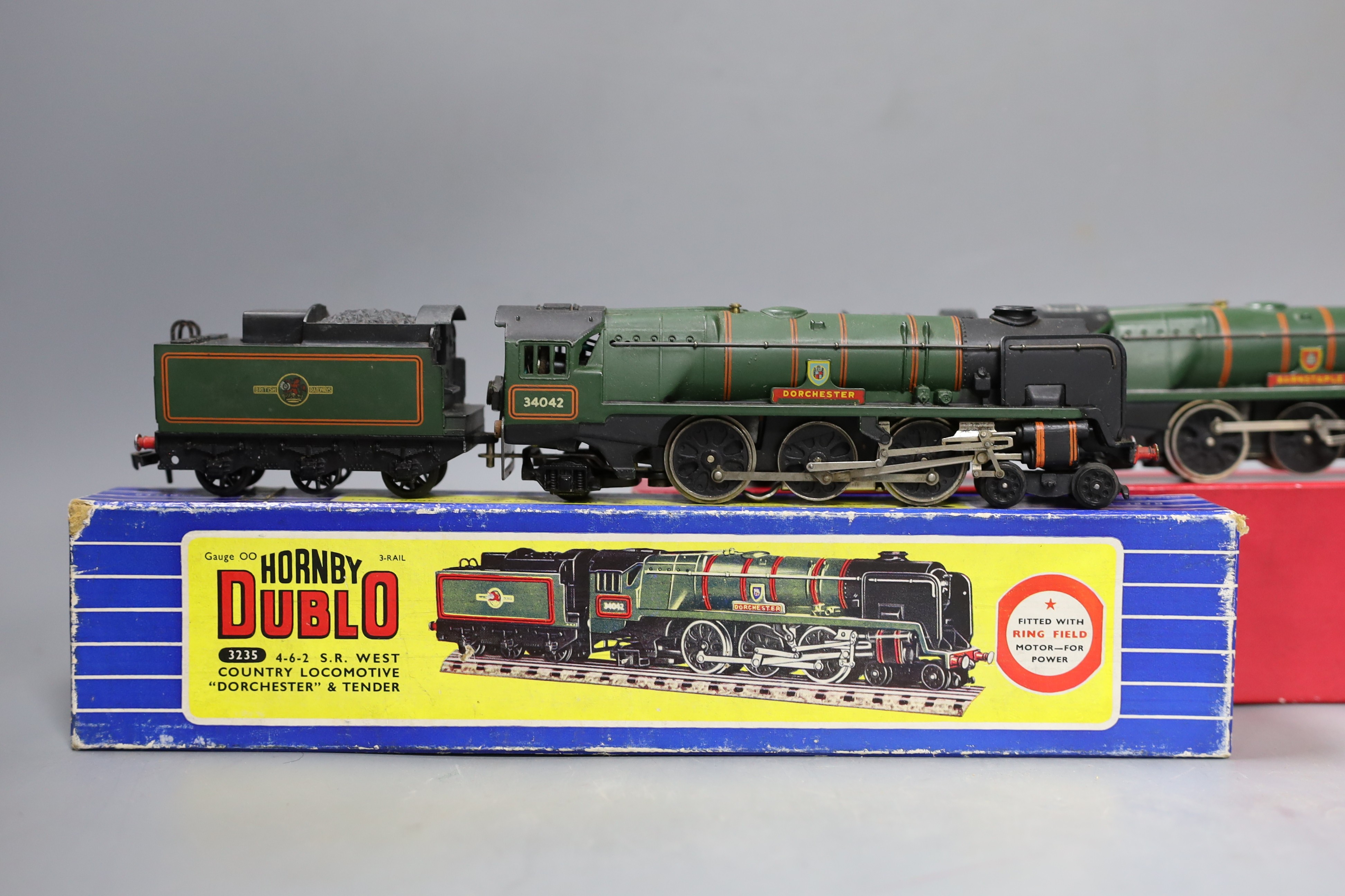 Two Hornby Dublo locomotives and tenders – 3235 4-6-2 S.R. West Country locomotive Dorchester and tender (3 rail) and 2335 4-6-2 West Country Barnstaple locomotive and tender